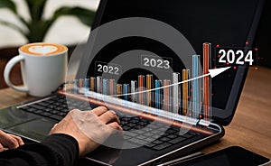 A graph of asset investments and an analysis of worldwide business expansion Business and Finance Arrow pointing up Economic