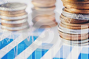 Graph on rows of coins for finance and banking on digital stock