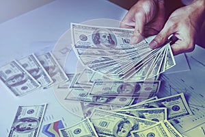 Graph,summary report text and money on the table abstract color