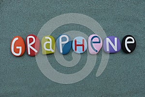 Graphene, a single layer of carbon atom, creative text composed with multi colored stone letters