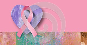 Graphic cancer ribbon and heart icons in pink abstract background