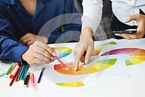 Graphic designer asian working together color swatches ux design editor ideas concept