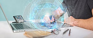 Graphic designer using digital triangle exploding sphere hologram 3D rendering