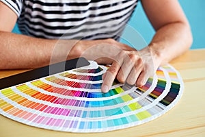 Graphic designer choosing a color