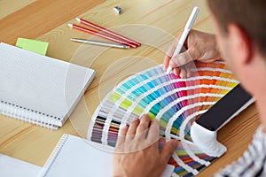 Graphic designer choosing a color