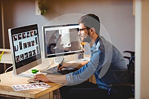 Graphic designer using a graphics tablet