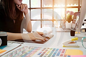 Graphic designer woman working on creative office with create gr