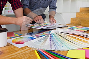 Graphic designers choose colors from the color bands samples for design .Designer graphic creativity work concept