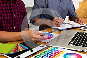 Graphic designers choose colors from the color bands samples for design .Designer graphic creativity work concept