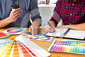 Graphic designers choose colors from the color bands samples for design .Designer graphic creativity work concept