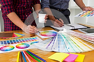 Graphic designers choose colors from the color bands samples for design .Designer graphic creativity work concept