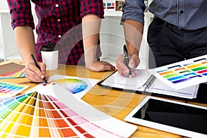 Graphic designers choose colors from the color bands samples for design .Designer graphic creativity work concept