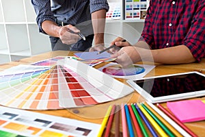 Graphic designers choose colors from the color bands samples for design .Designer graphic creativity work concept