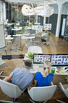 Graphic designers working at their desk