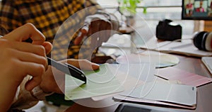 Graphic designers working together at desk in a modern office 4k