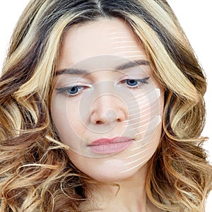 Graphic lines shows facial lifting effect on skin of beautiful woman.