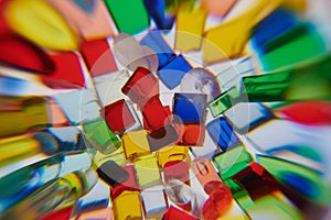 graphic picture of multicolored plastic resin granulates