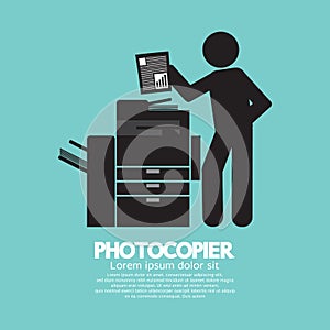 Graphic Symbol Of A Man Using A Photocopier photo