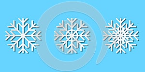 Graphic vector set of paper cut snowflakes; white paper art snow