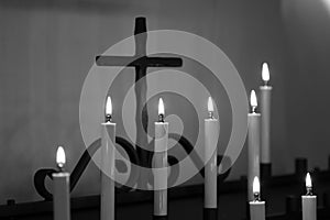 A graphical view of closeup of candles and crucifix, Rupert Mayer Church Unterkirche in Citizen`s Hall Church BÃ¼rgersaalkirche