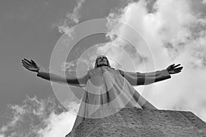 A graphical view of the rooftop sculpture of Jesus, Church of the Sacred Heart of Jesus, Barcelona, Catalonia, Spain photo