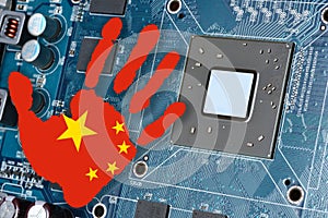 Graphics card with processor and microchip with an handprint with the colors of China Flag. Concept for global battle and monopoly