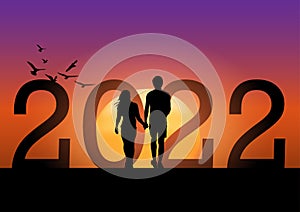Graphics drawing couple boy and girl stand to look the 2022 for new year with light silhouette orange vector illustration concept