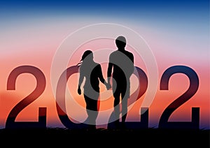 Graphics drawing couple boy and girl stand to look the 2022 for new year with light silhouette orange vector illustration concept