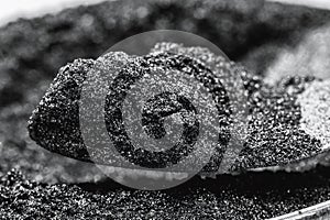 graphite powder, industrial use, isolated white background, macro photography