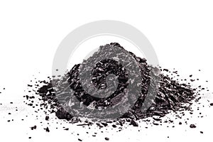 Graphite powder used in industry, black powder with isolated white background and copy space