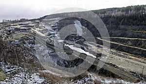 Graphite quarry. Open pit mining of graphite photo