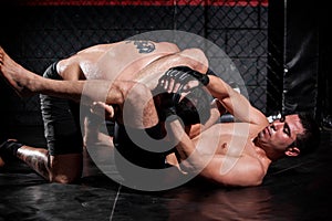 Grappling and controlling his rival photo