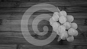 graps on a table in black and white