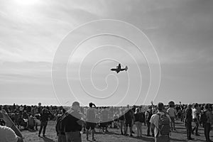 Grascale shot of C-130 transport plane at the Sanicole airshow in Belgium.