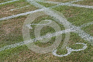 Grass athletics track showing first, second, third