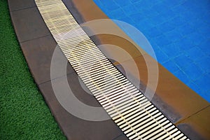 grass background in the edge of a pool