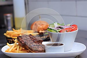 Grass Fed Rump Steak with chips salad and pepper sauce