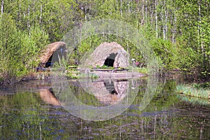 Grass huts at the lakeshore