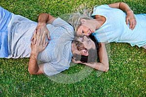 Grass laying couple