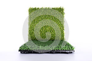 Grass mat on white background. Artificial turf tile background. Object and background concept