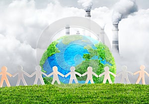 grass planet Earth with chain of people, carbon emissions and greenhouse gas emissions concept of carbon footprint