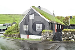 Grass roof on black wooden house Faroe Islands, Faroes, Danmark