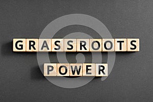 Grassroots power - words from wooden blocks with letters photo