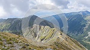 Grassy mountain ranges shrouded in low clouds, Slovakia, Europe