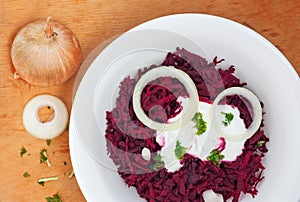 Grated beets with chopped onion