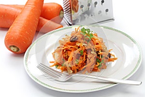 Grated carrot salad and grater