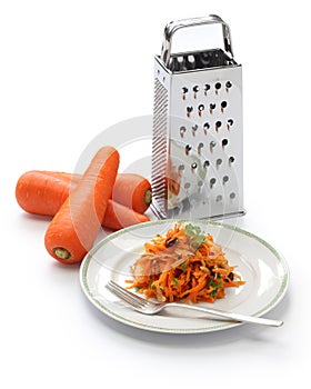 Grated carrot salad and grater