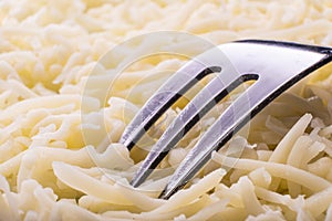 Grated cheese close up.