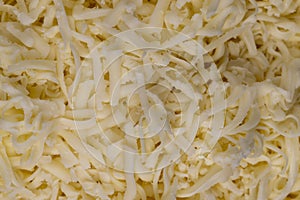 grated cheese in large quantities at home