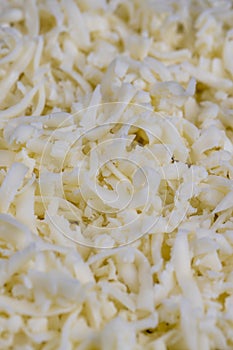 grated cheese in large quantities at home